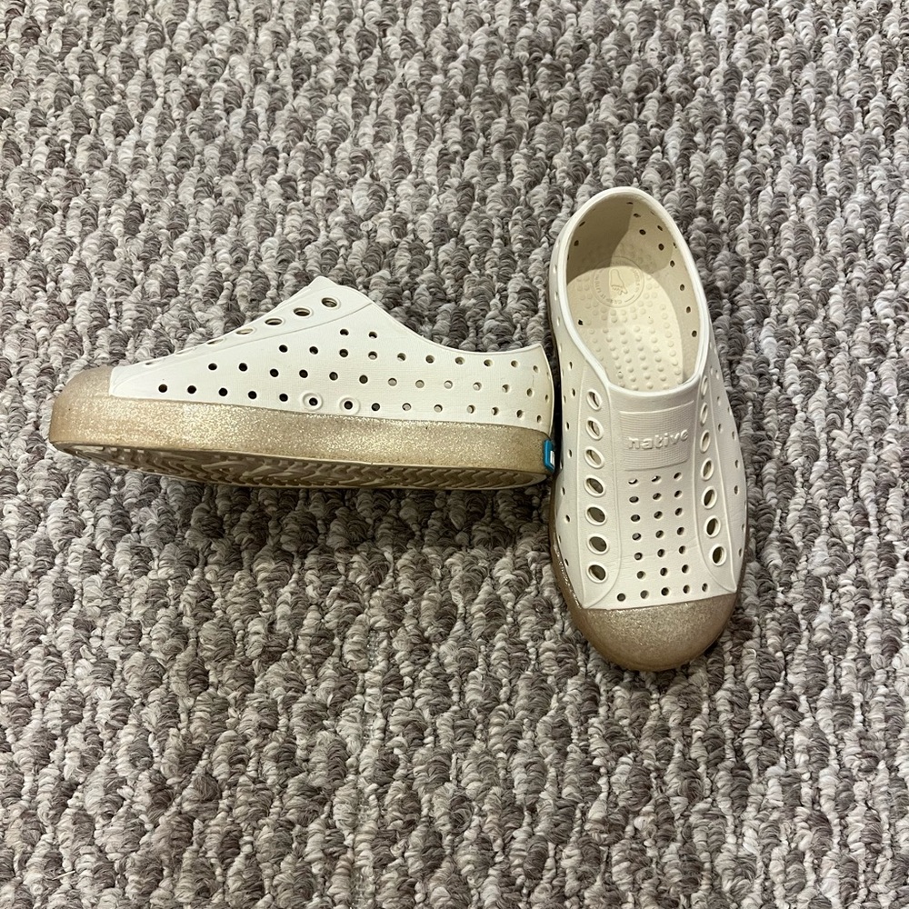 Toddler size 10 Natives- barely worn, great condition. Gold with gold glitter.